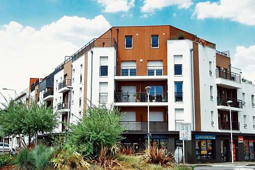 high rise white and brown building town